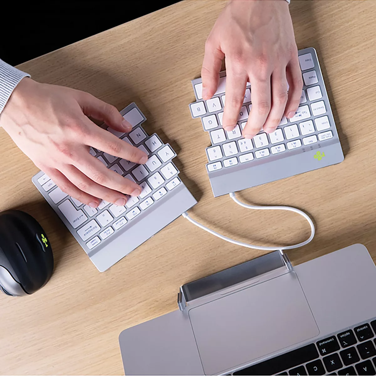 77e614886f1d0e6a6210daec4f3944007dcd3279_r_go_tools_clavier_ergonomique_r_go_rvb_1200x1200.jpg Utilisation d'un clavier ergonomique divisé